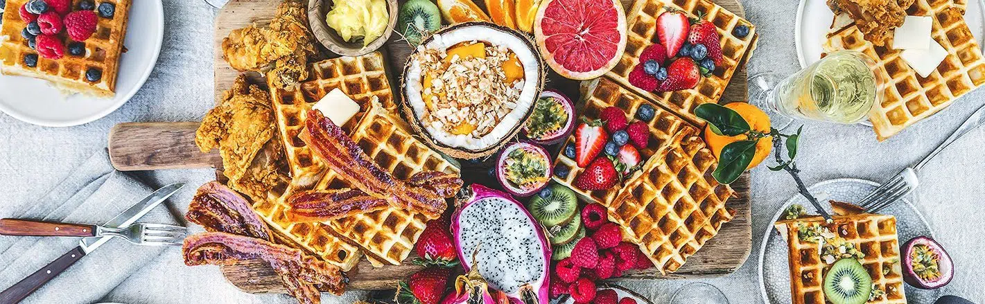 waffles and fruit on a table